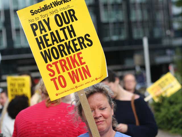 <p>NHS workers demonstrate, demanding pay rise and better working conditions in London. </p>