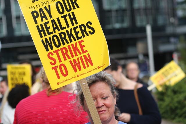 <p>NHS workers demonstrate, demanding pay rise and better working conditions in London. </p>