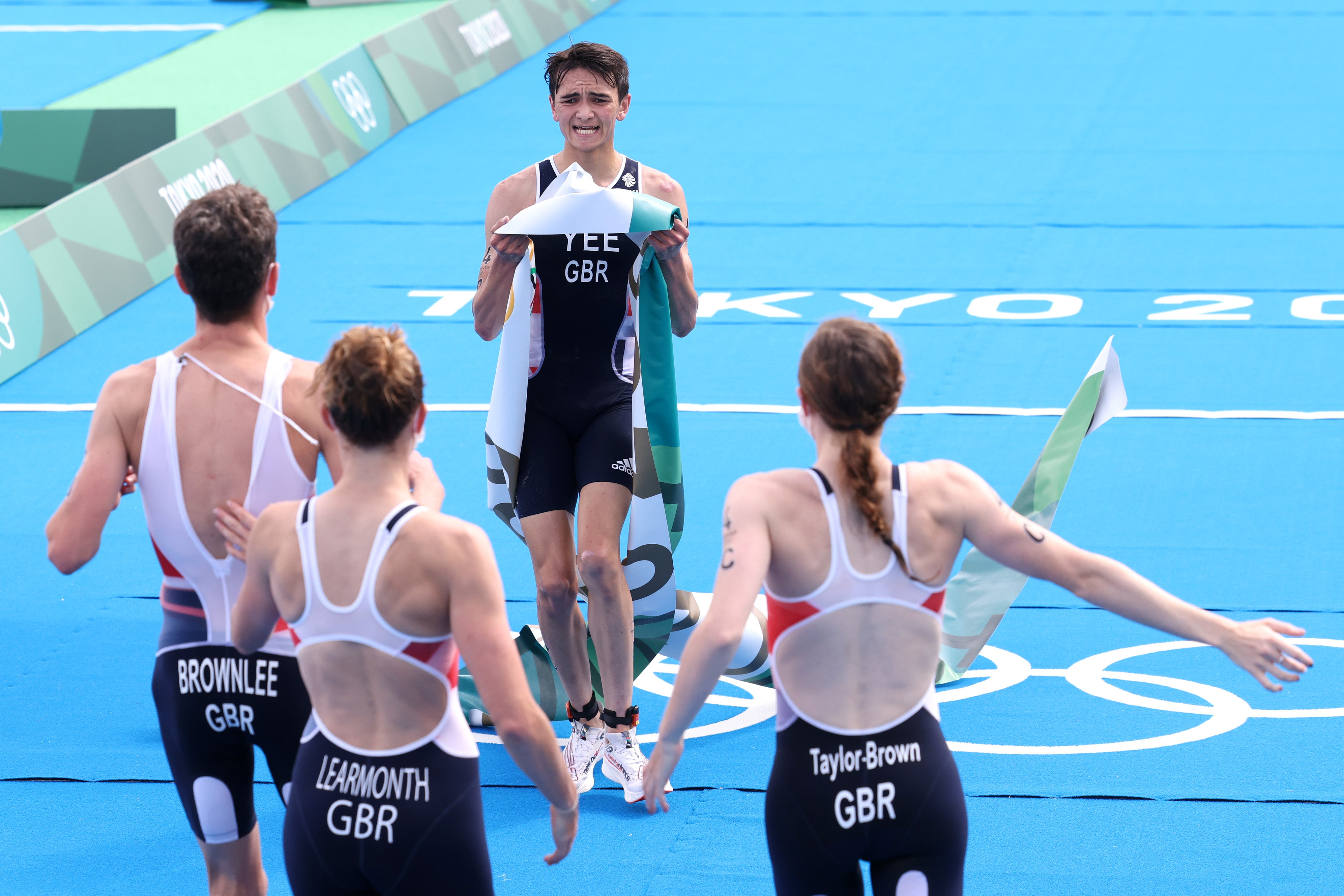 The old and new generation of British triathletes helped the team to a gold medal