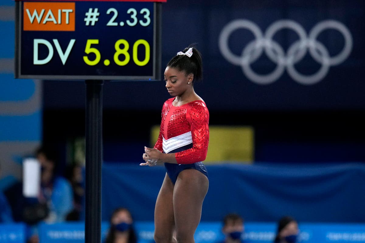 Biles out of vault and uneven bars; beam and floor possible