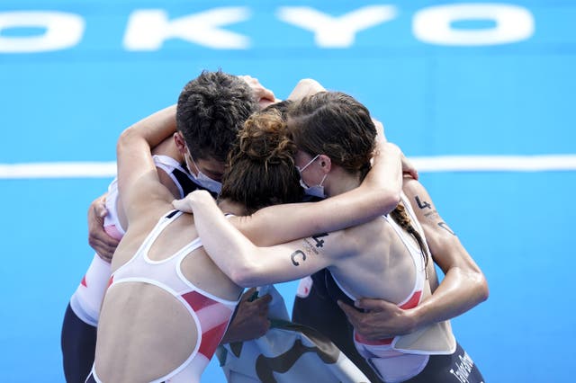 The British team celebrate their mixed relay gold (Danny Lawson/PA)