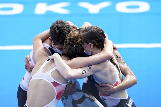 The British team celebrate their mixed relay gold (Danny Lawson/PA)
