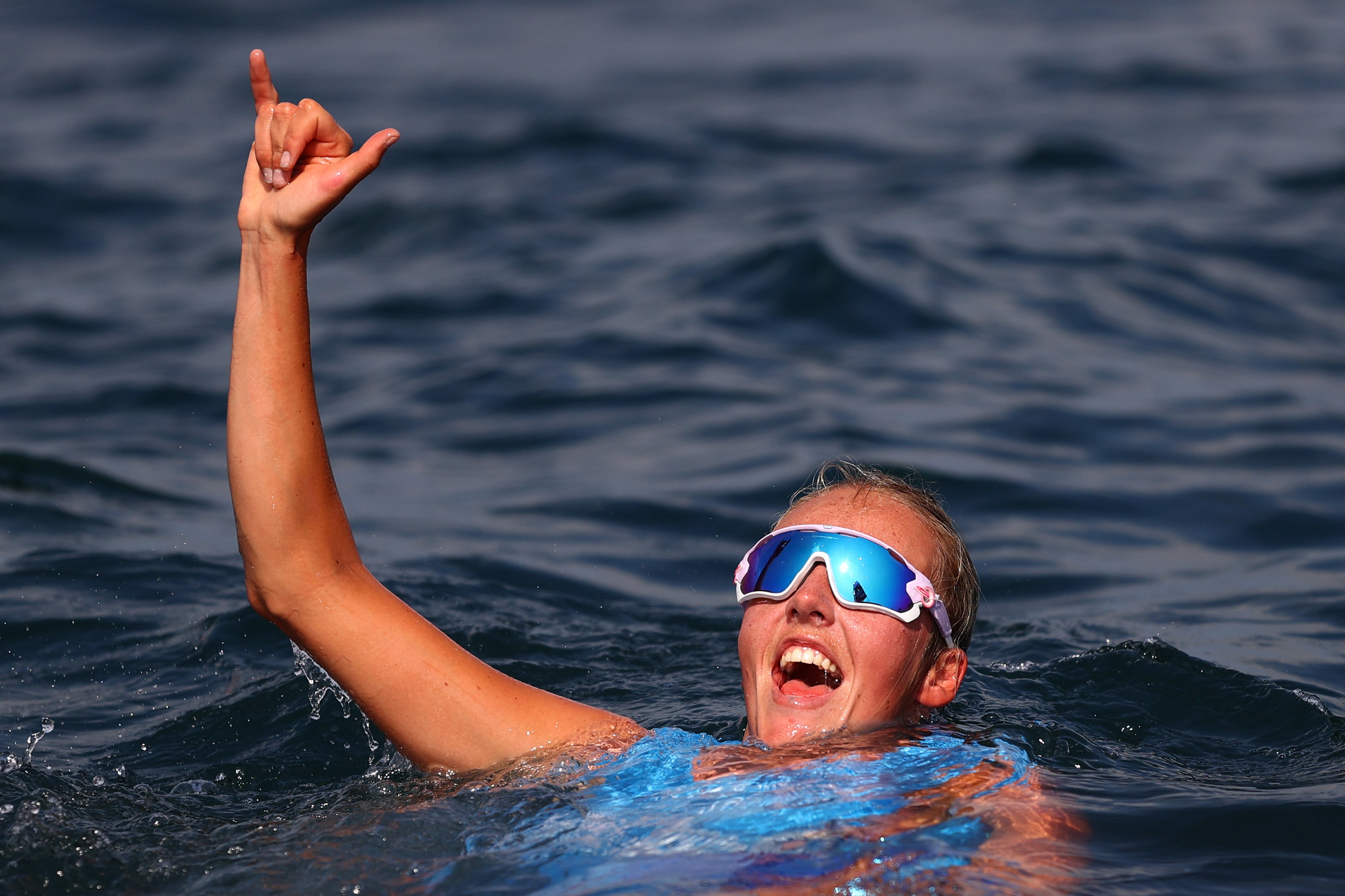 Wilson celebrates after finishing third for Team GB