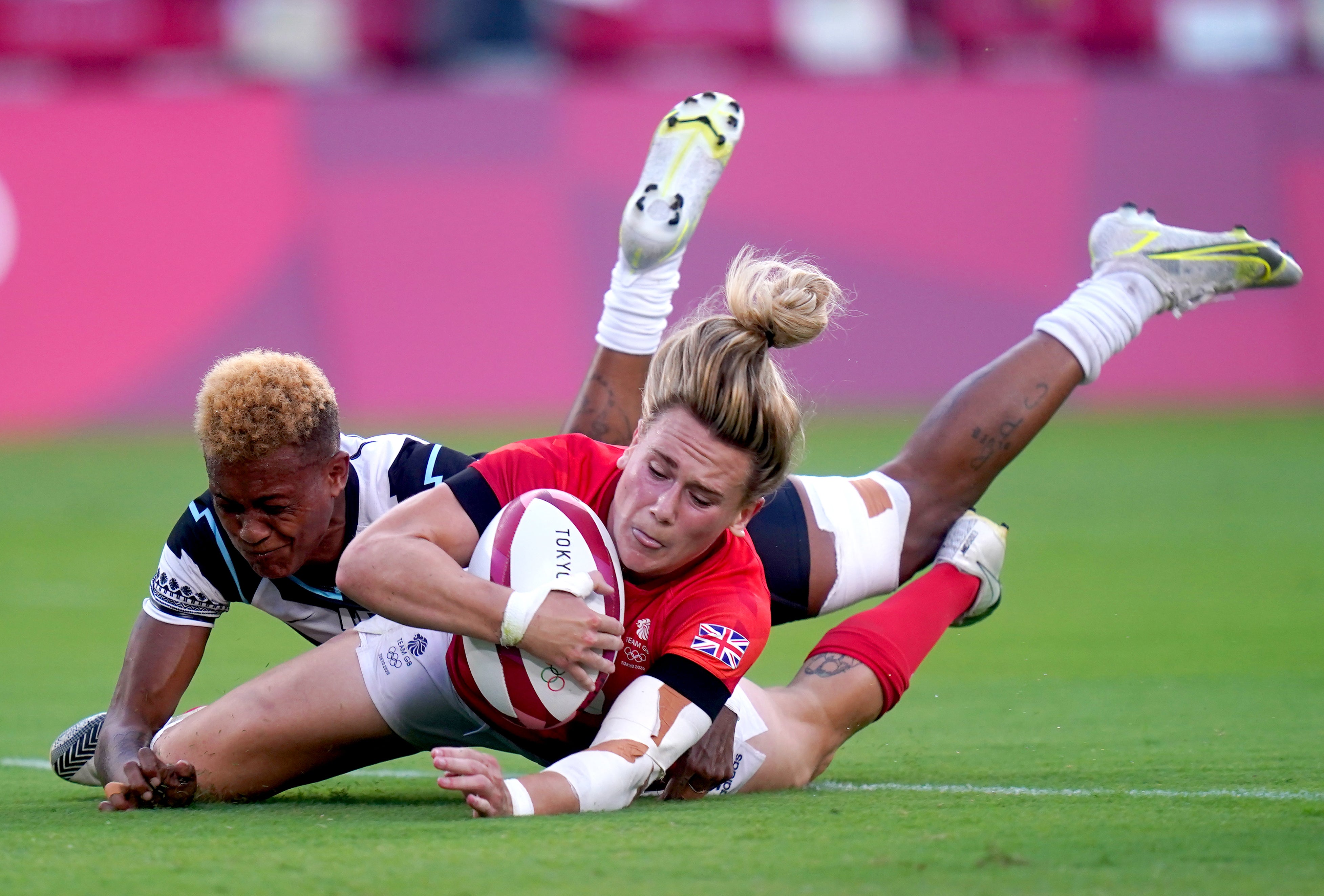 Great Britain’s Megan Jones is tackled in the Olympic Games bronze medal match (Adam Davy/PA)