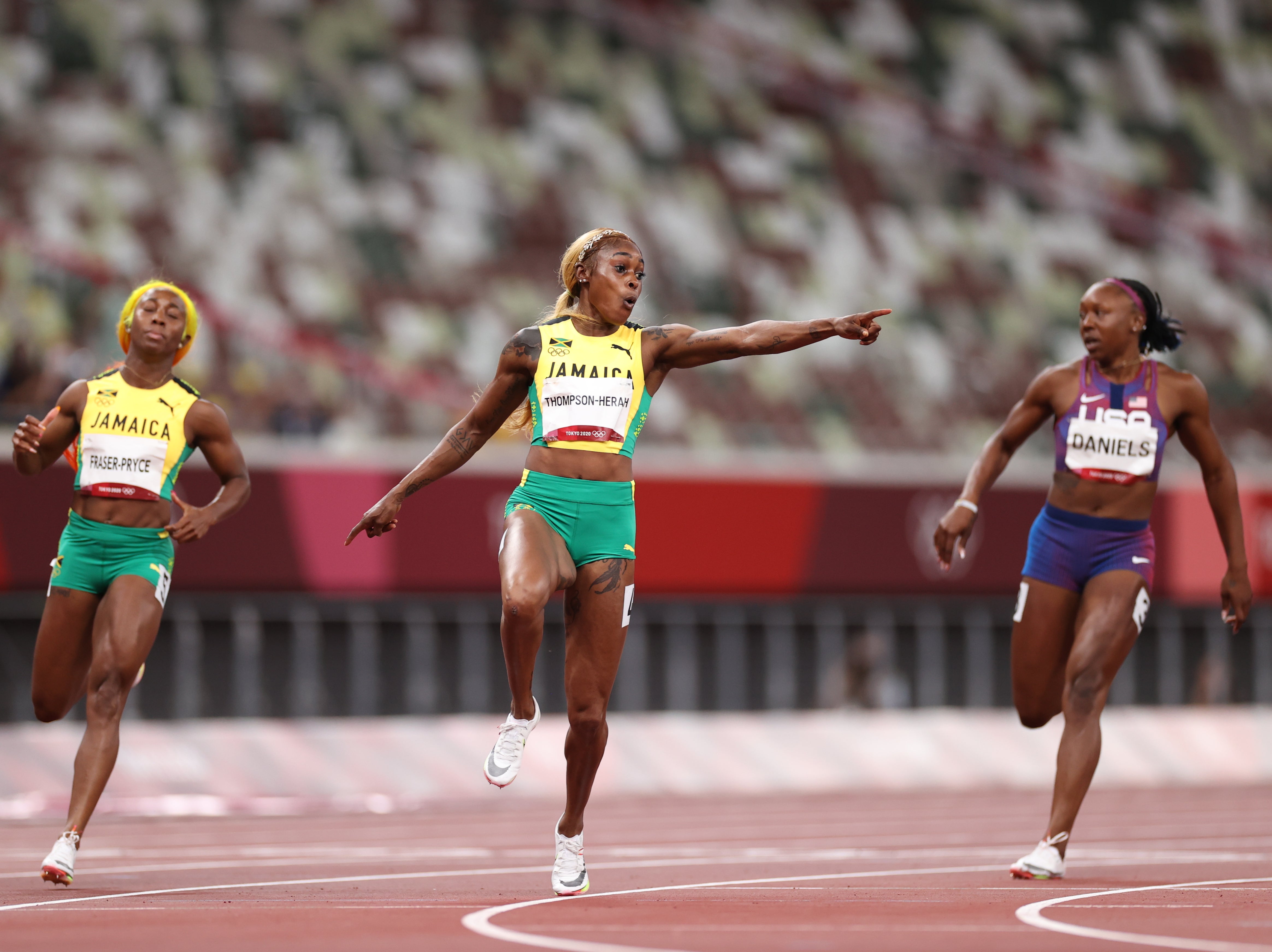 Elaine Thompson-Herah of Team Jamaica wins the women’s 100m final