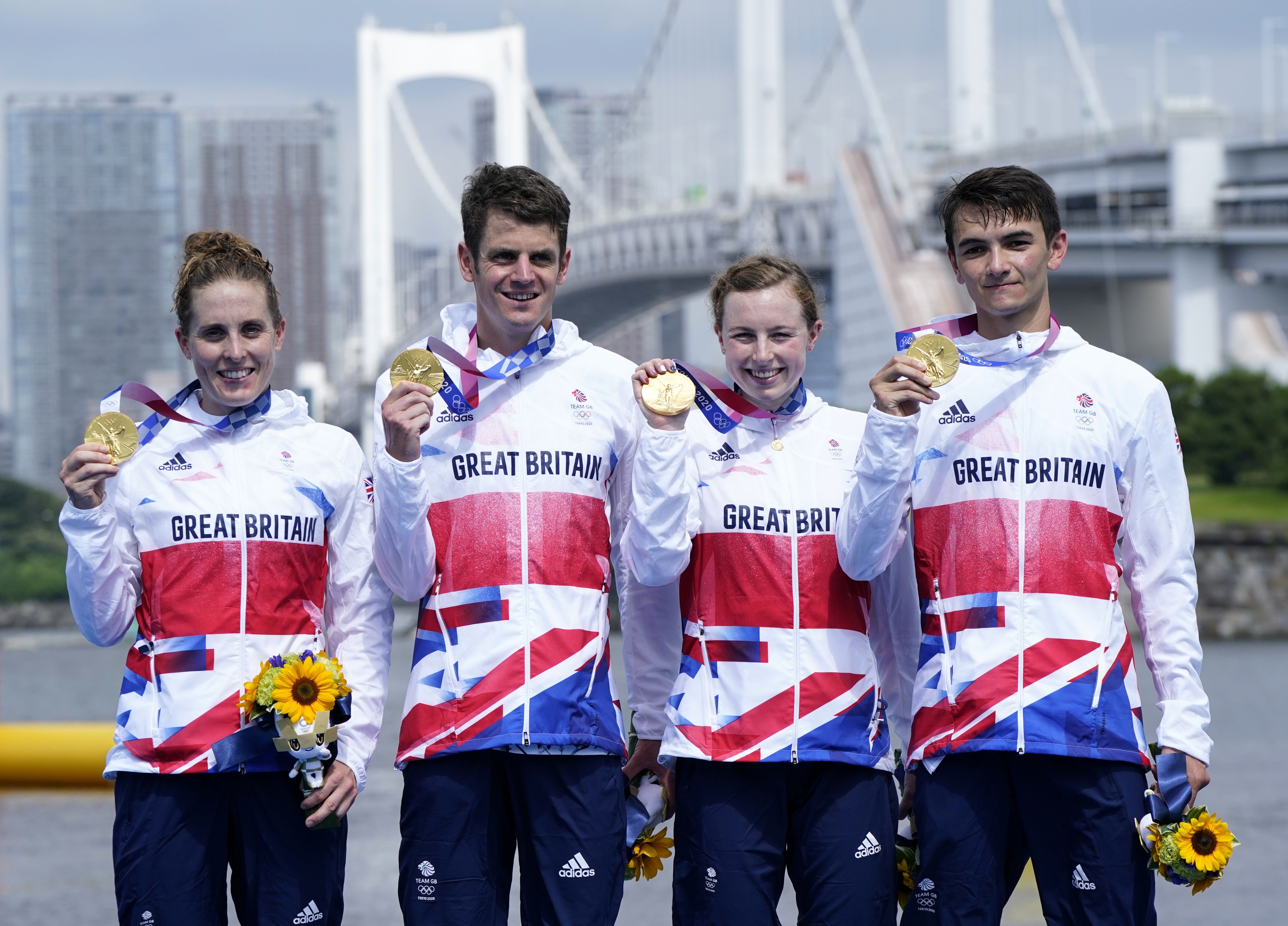 Jess Learmonth, Jonny Brownlee, Georgia Taylor-Brown and Alex Yee won the first Olympic mixed team relay (Danny Lawson/PA)