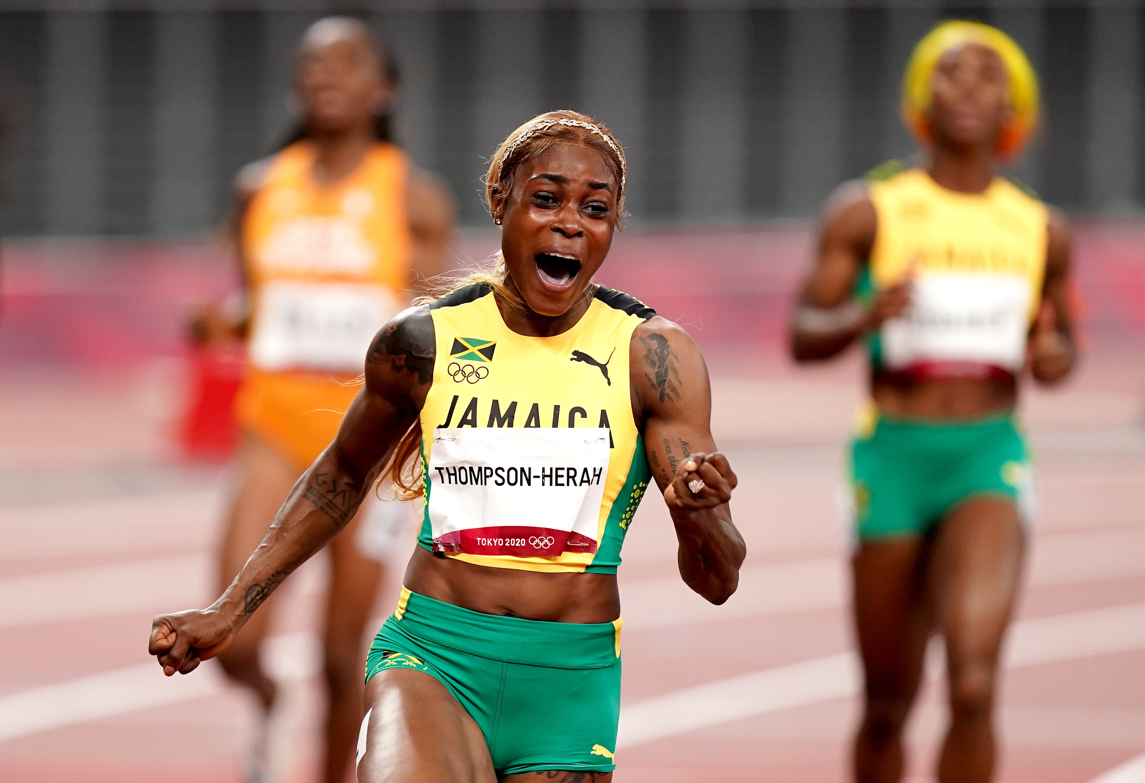 Jamaica’s Elaine Thompson-Herah celebrates winning the 100m. (Mike Egerton/PA)