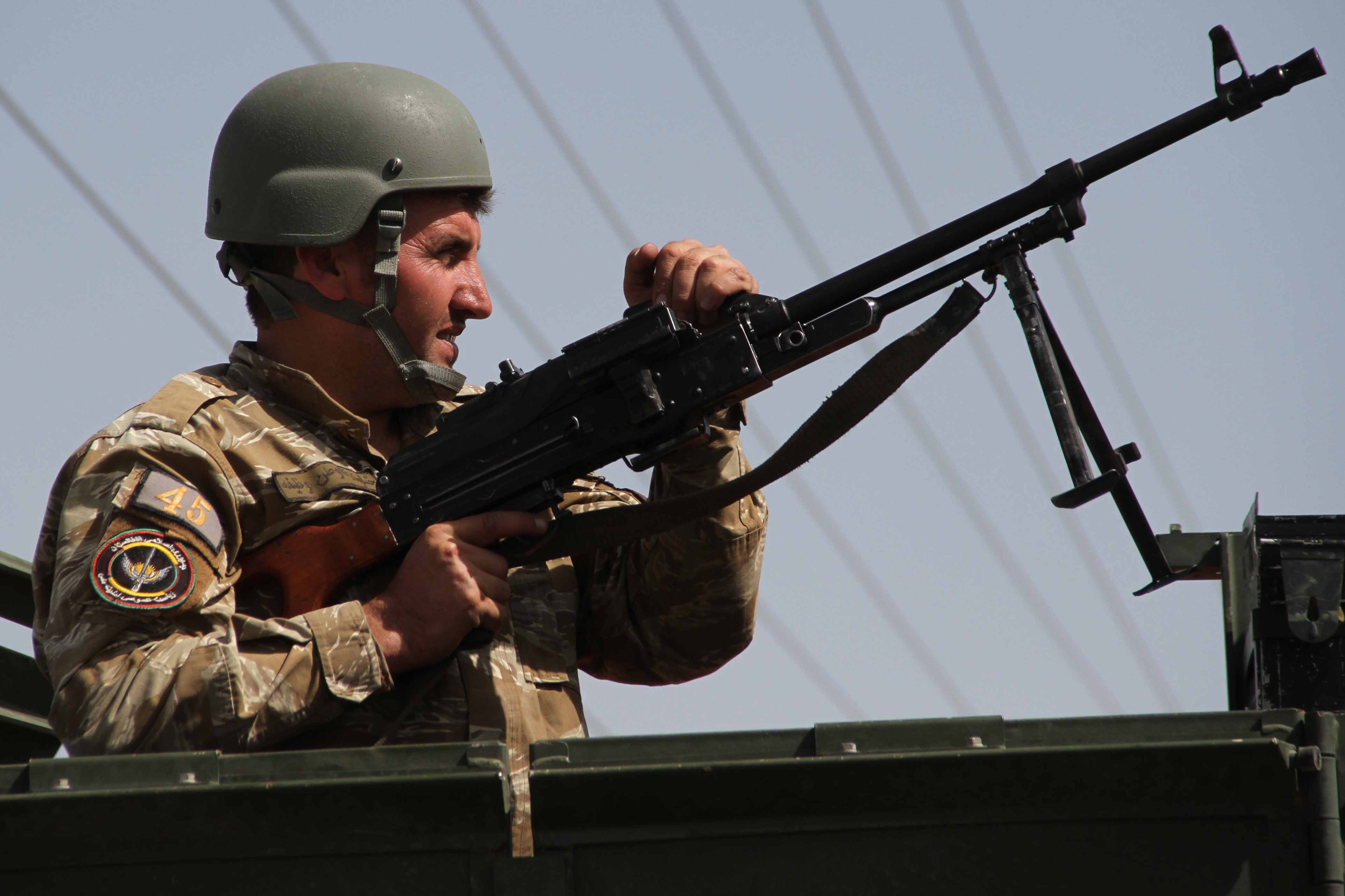 An Afghan security official in Herat, Afghanistan, on Saturday, where there is intense fighting by the Taliban.