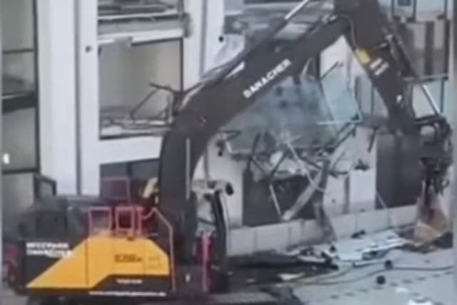 <p>A man has destroyed a new appartment build with a digger</p>