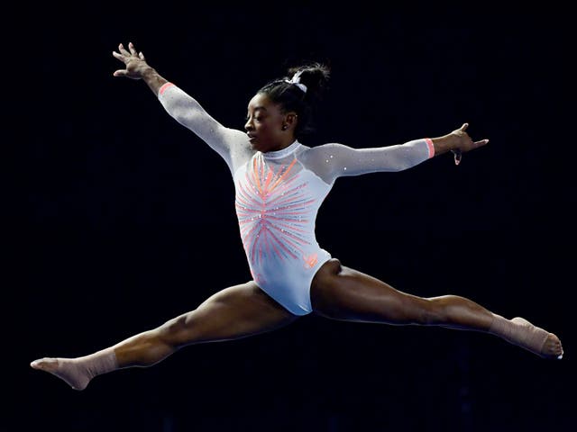 <p>Simone Biles performs her floor routine during a US gymnastics competition</p>