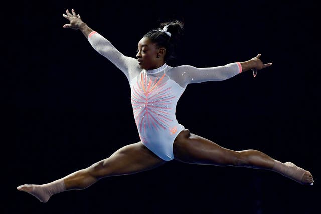 <p>Simone Biles performs her floor routine during a US gymnastics competition</p>