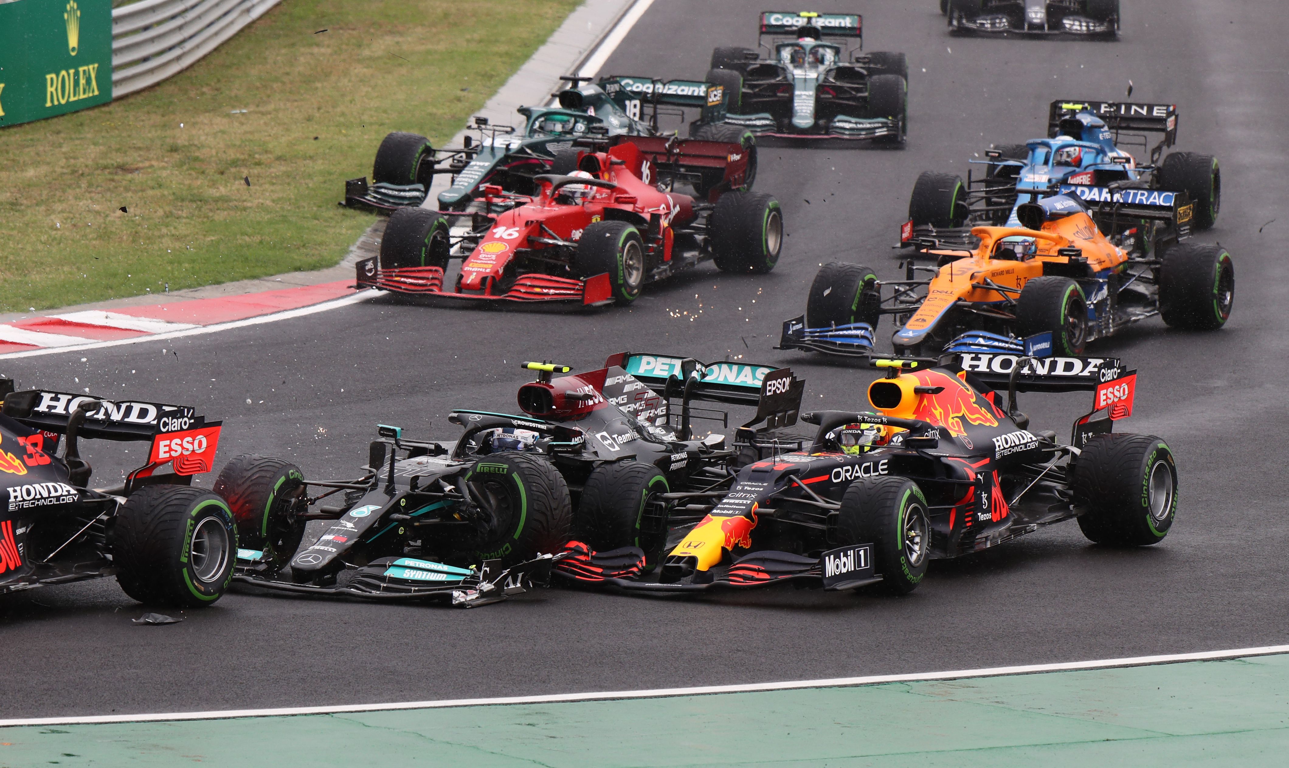 Bottas (front-centre) collides with Perez (front-right)