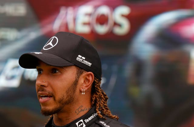 Lewis Hamilton was critical of his team after battling onto the podium (Florion Goga/AP)