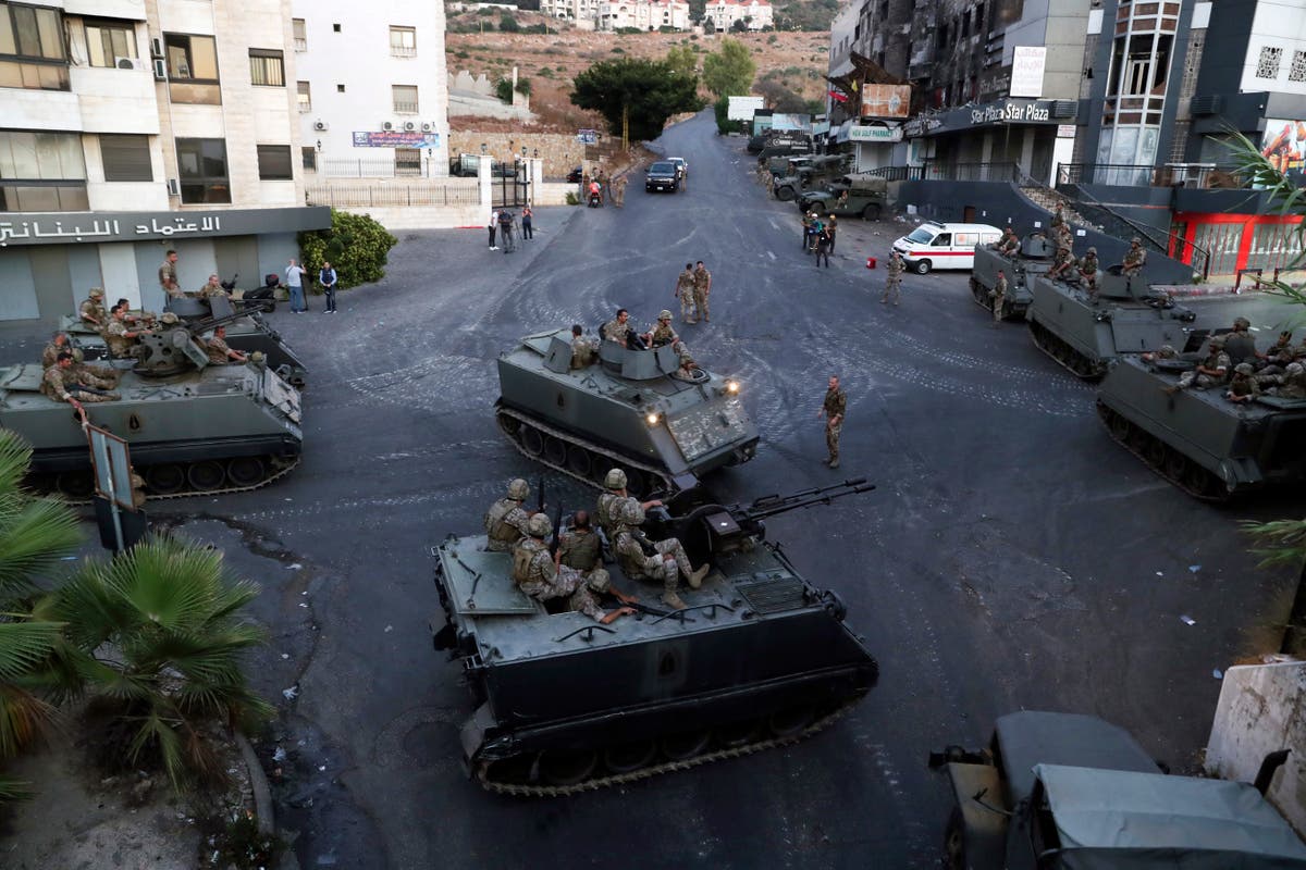 Gunmen kill 2 at funeral for Hezbollah commander in Lebanon