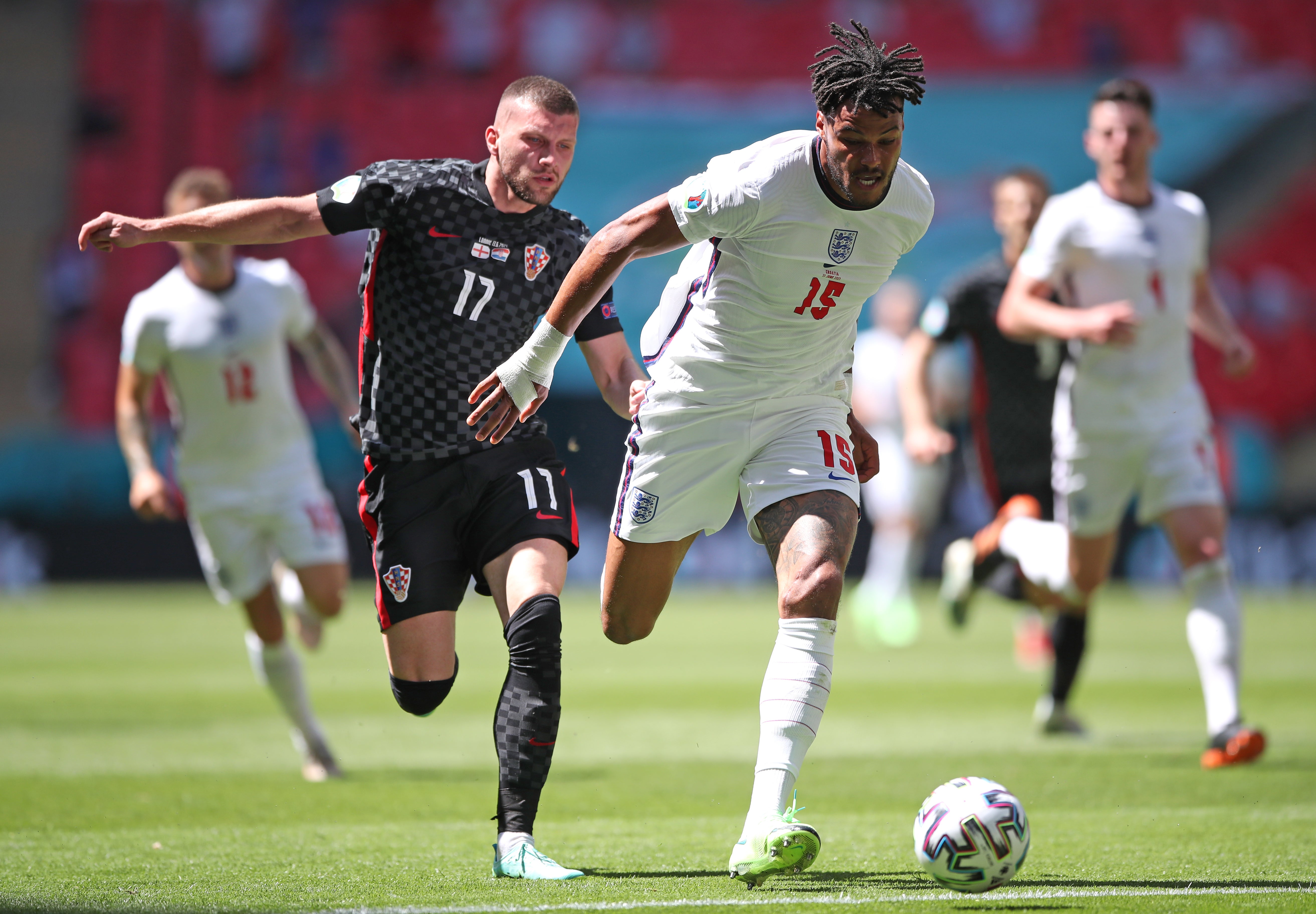 Tyrone Mings, right, shields the ball from Croatia’s Ante Rebic (Nick Potts/PA)
