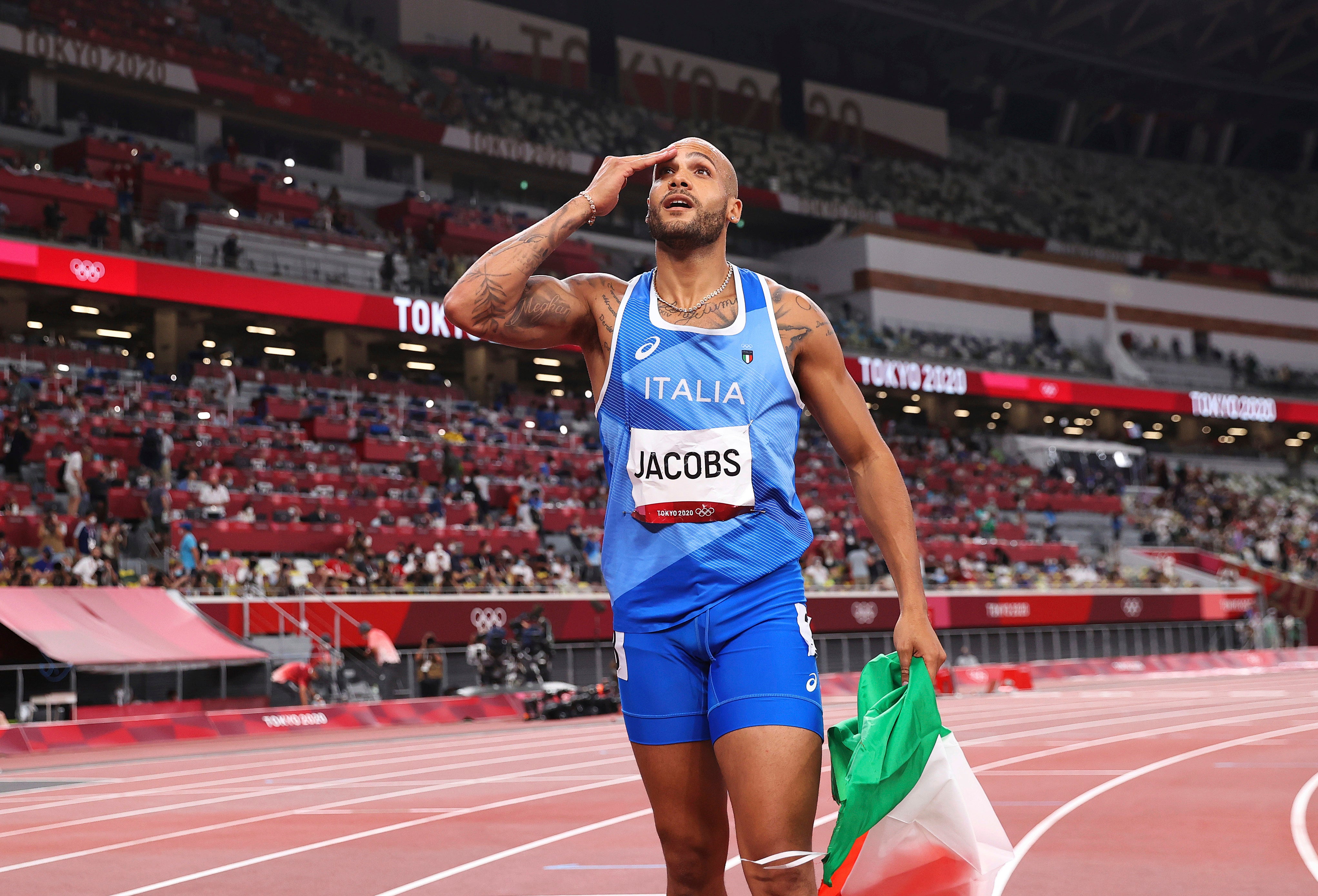 <p>Marcell Jacobs celebrates his 100m triumph on Sunday</p>