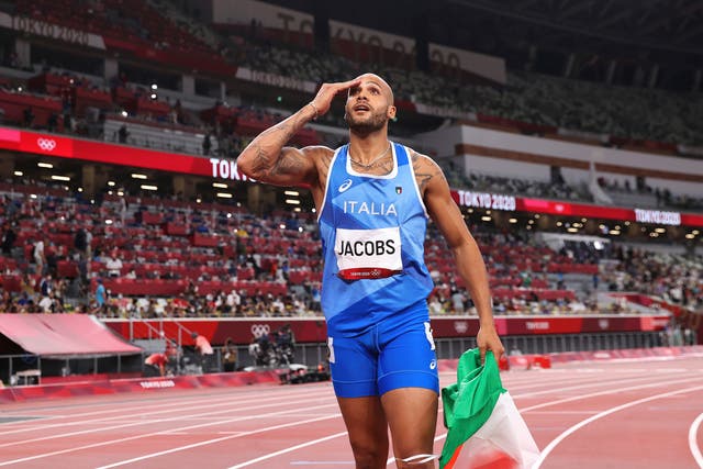 <p>Marcell Jacobs celebrates his 100m triumph on Sunday</p>