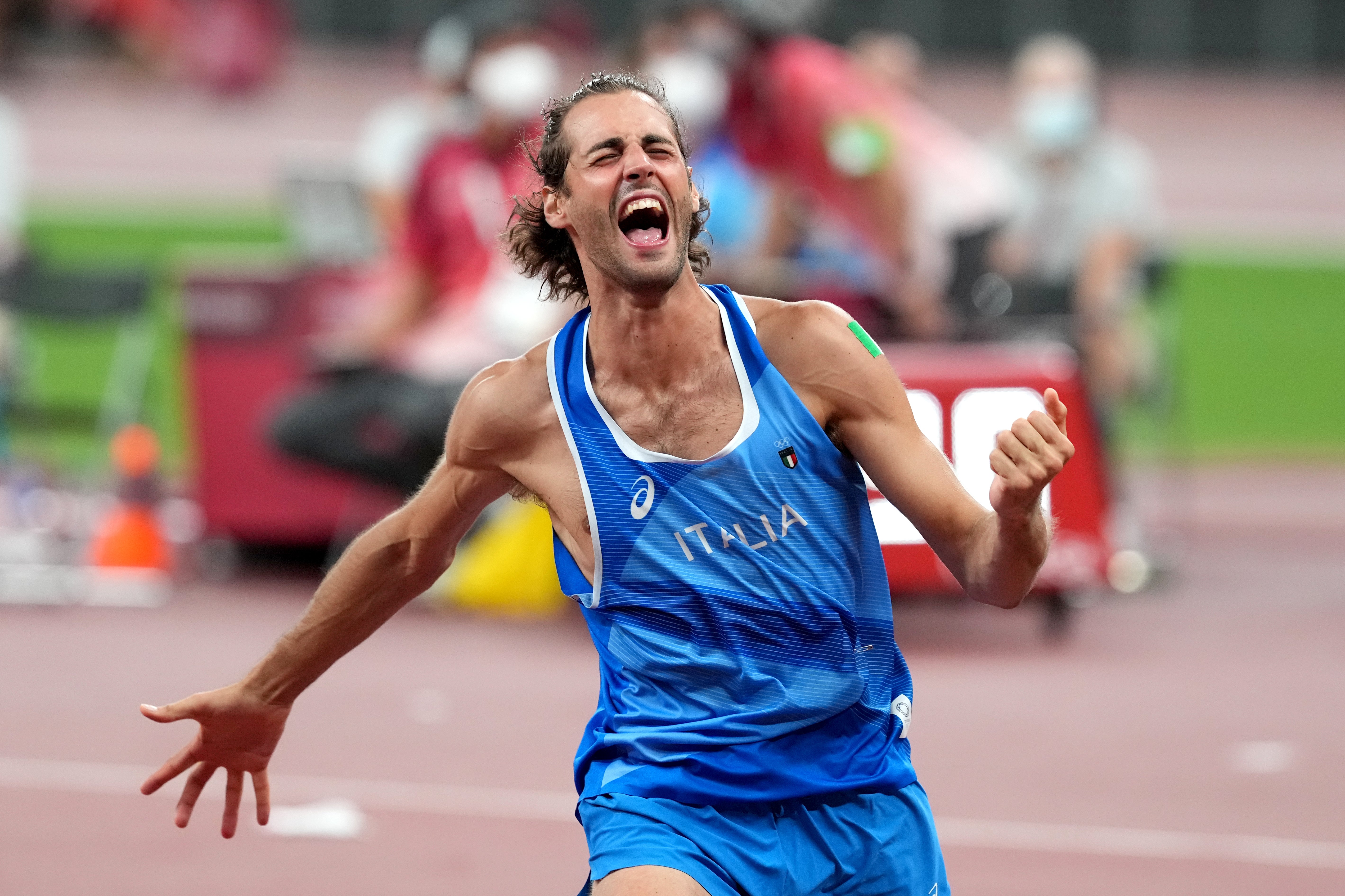 Italy’s Gianmarco Tamberi celebrated his ‘joint’ gold medal in the high jump (Martin Rickett/PA)