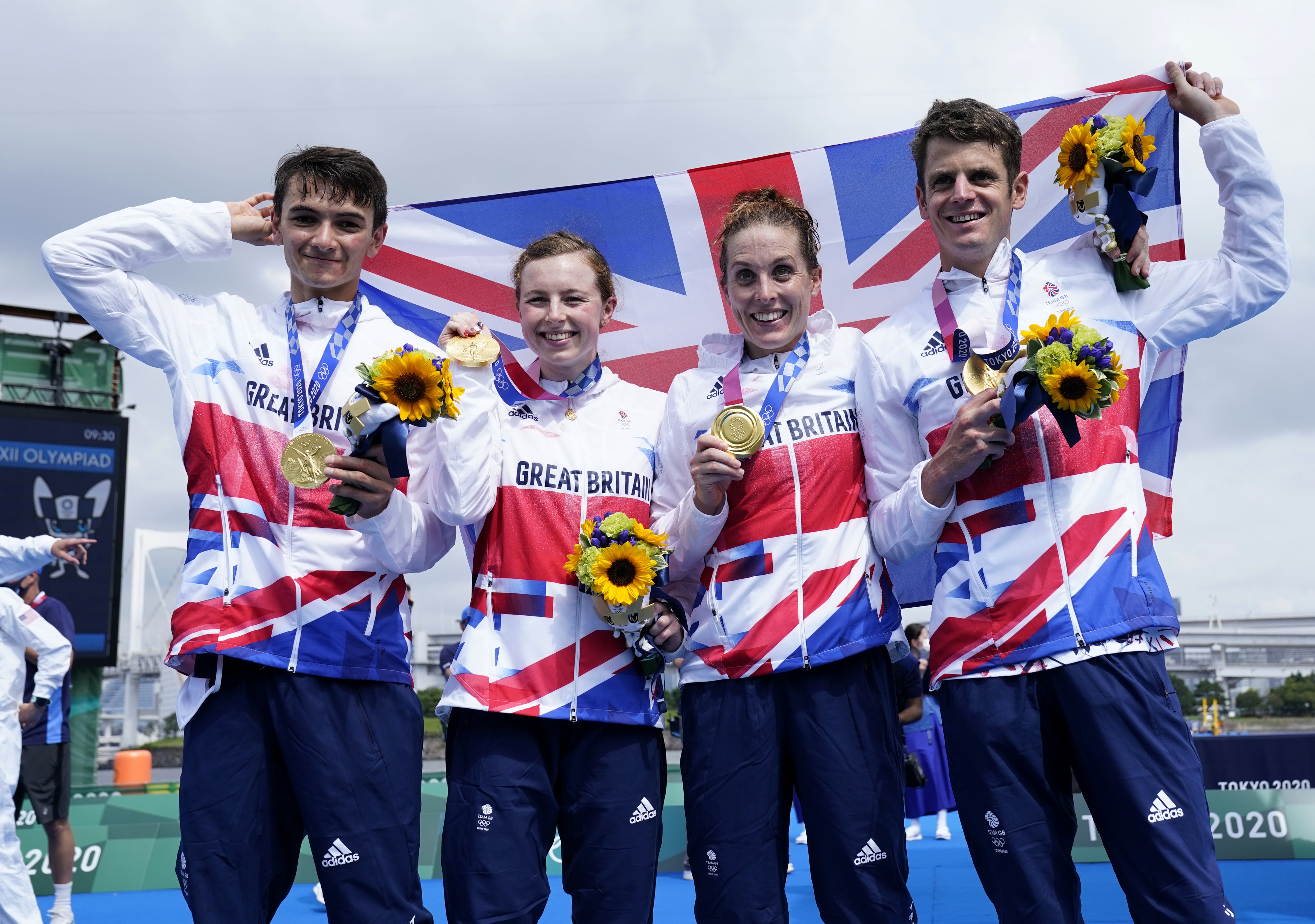 Alex Yee, Georgia Taylor-Brown, Jessica Learmonth and Jonny Brownlee cheer their victory