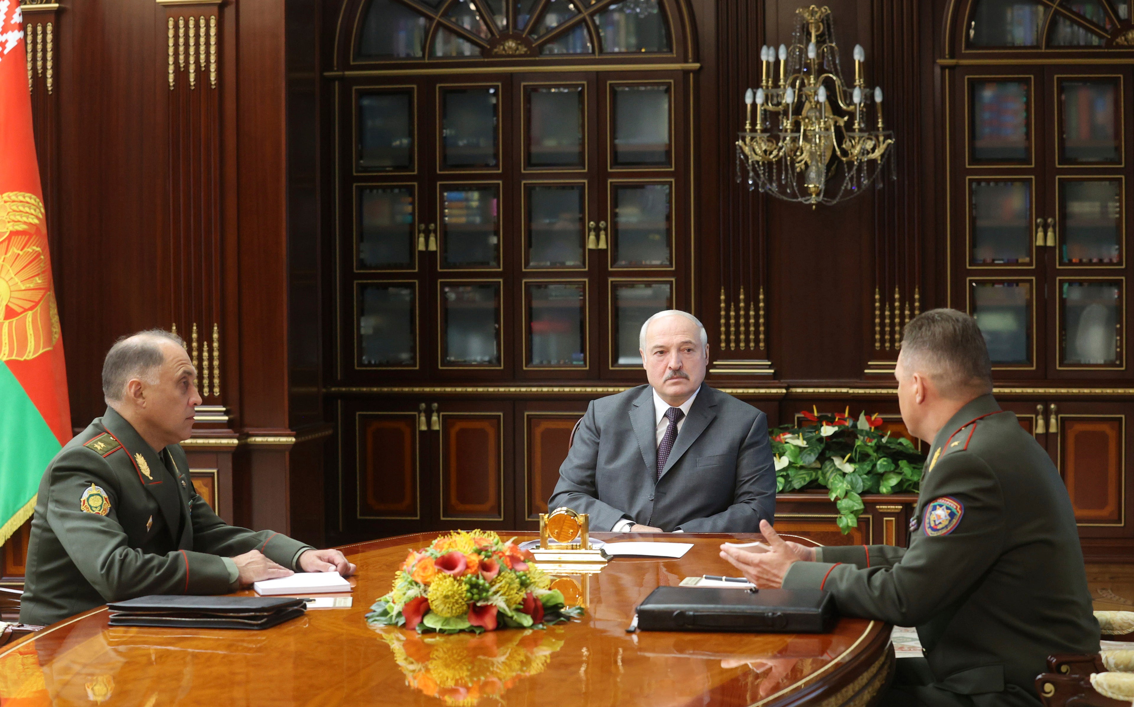 Belarusian President Alexander Lukashenko and his aides