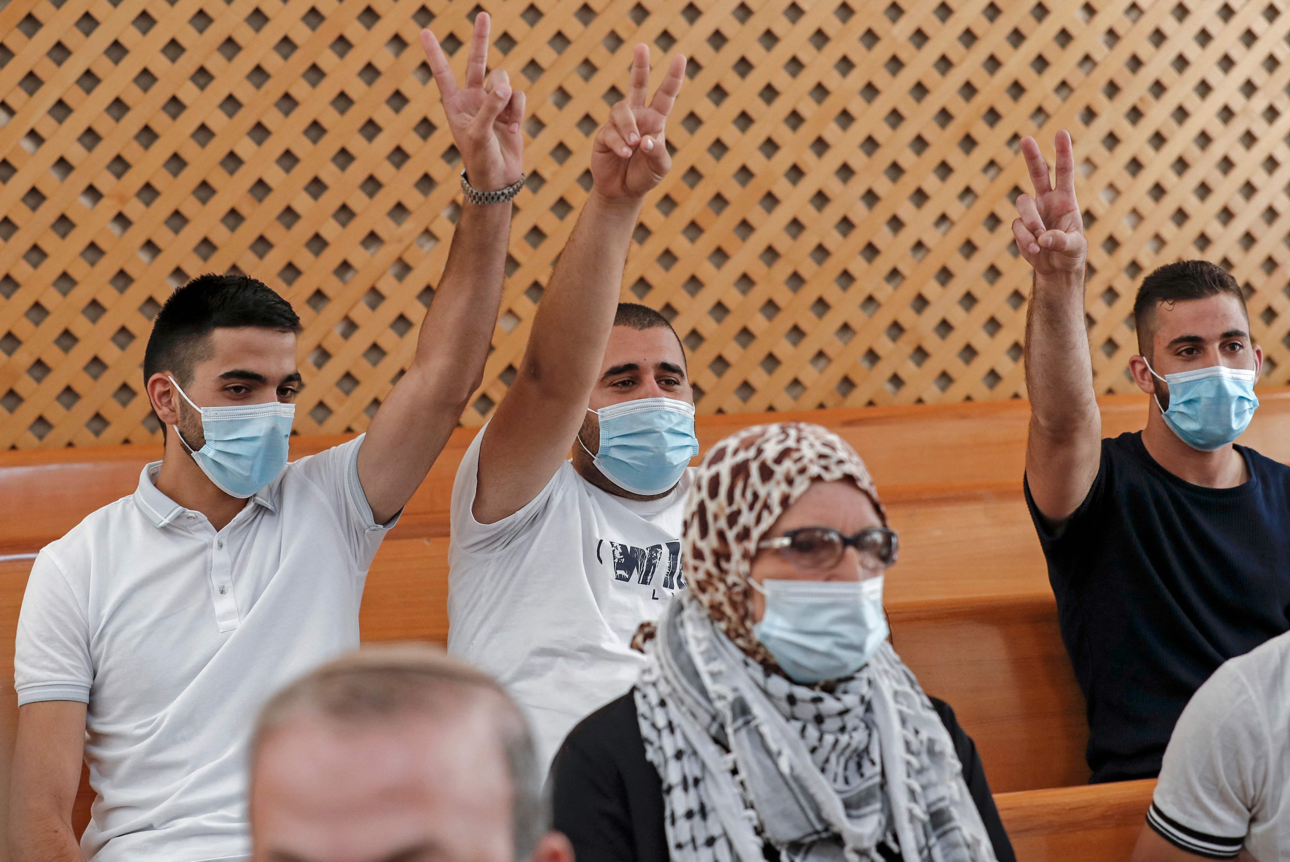 Palestinian residents of the Sheikh Jarrah neighbourhood attend a hearing at Israel's supreme court in Jerusalem on August 2