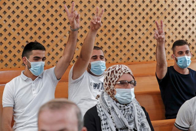 <p>Palestinian residents of the Sheikh Jarrah neighbourhood attend a hearing at Israel's supreme court in Jerusalem on August 2</p>