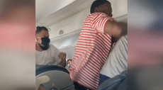 Video shows passengers brawling on flight over reclining seat