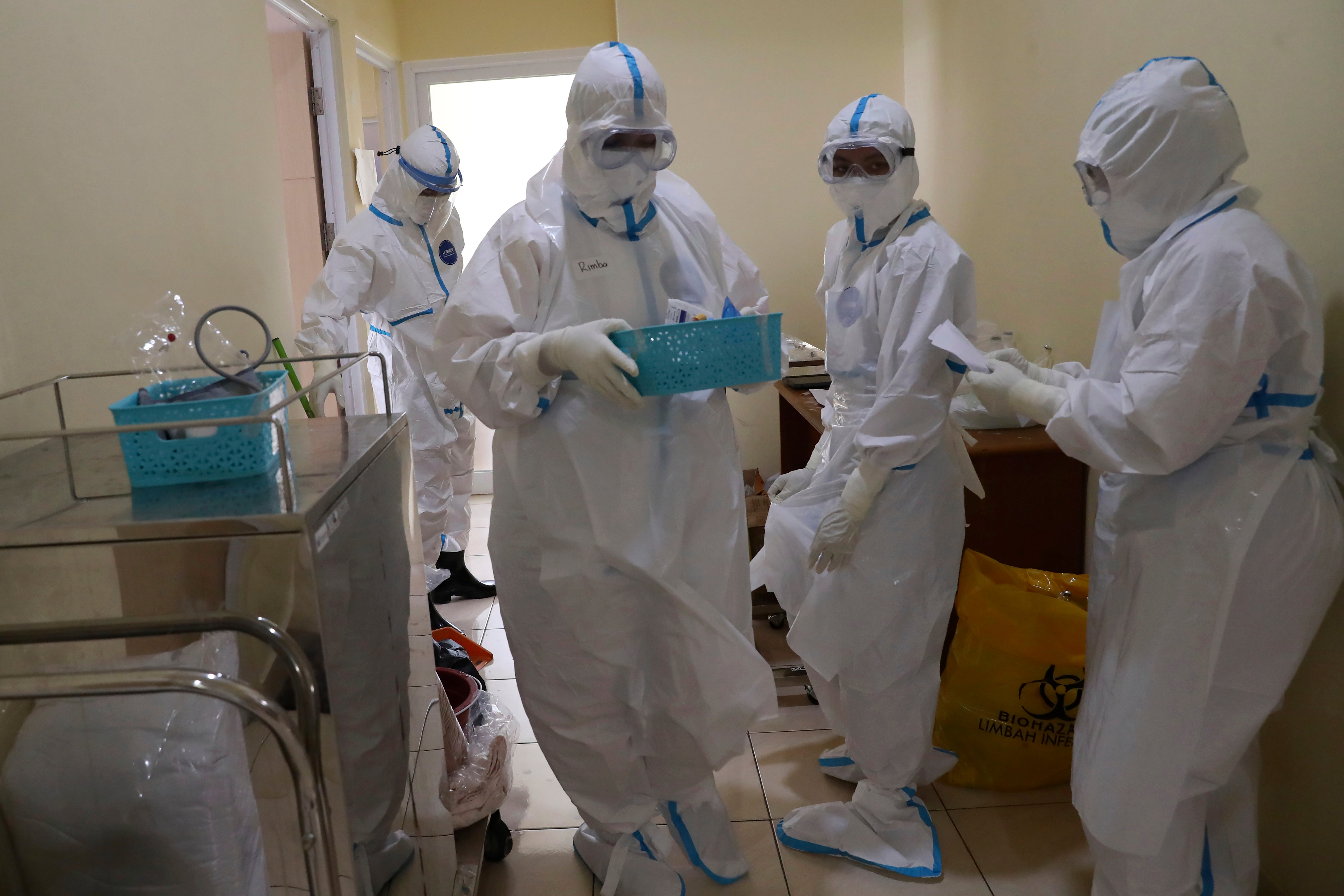 Virus Outbreak Indonesia Doctors