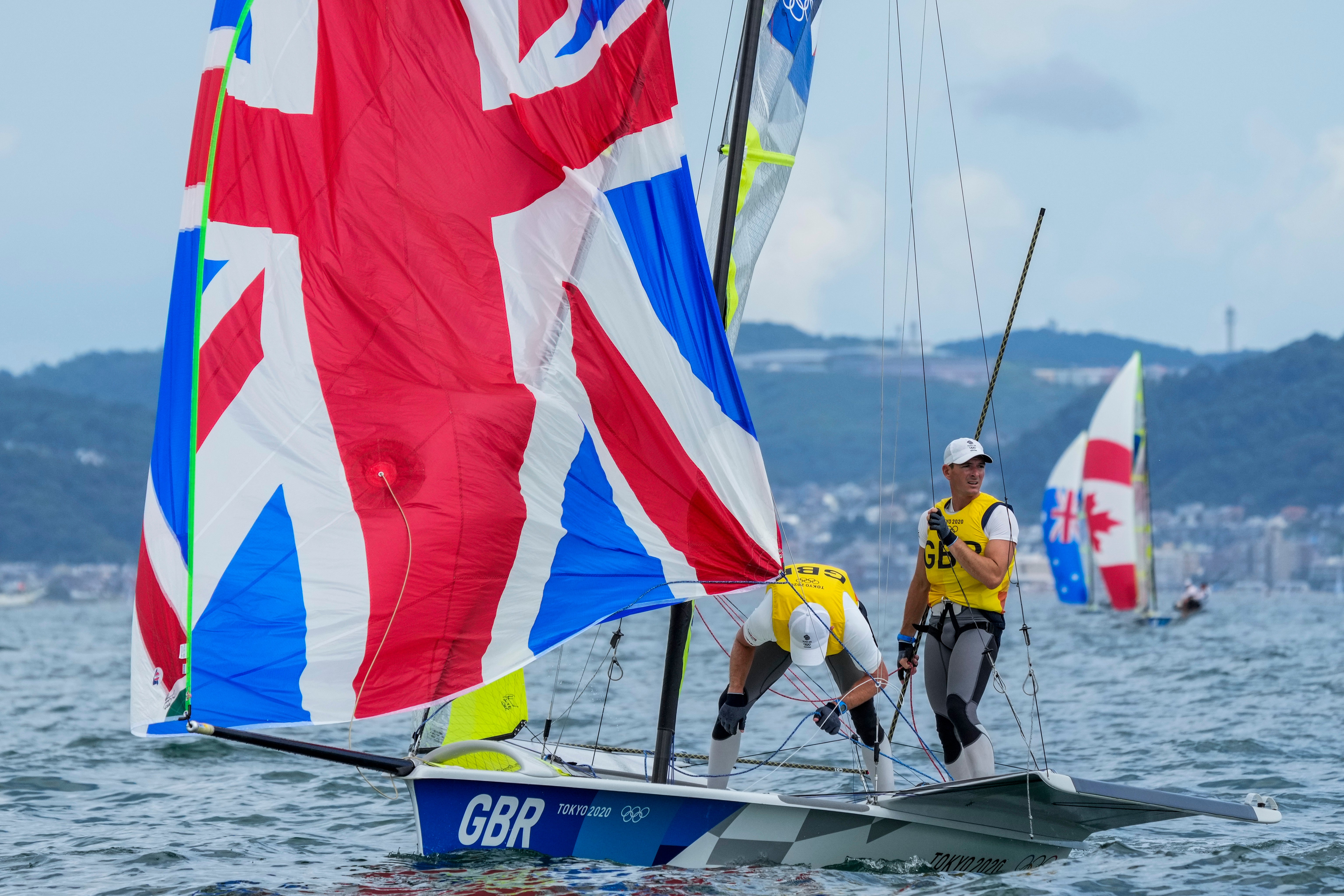 Great Britain’s Dylan Fletcher and Stuart Bithell en route to 49er sailing gold in Tokyo (AP Photo/Bernat Armangue)