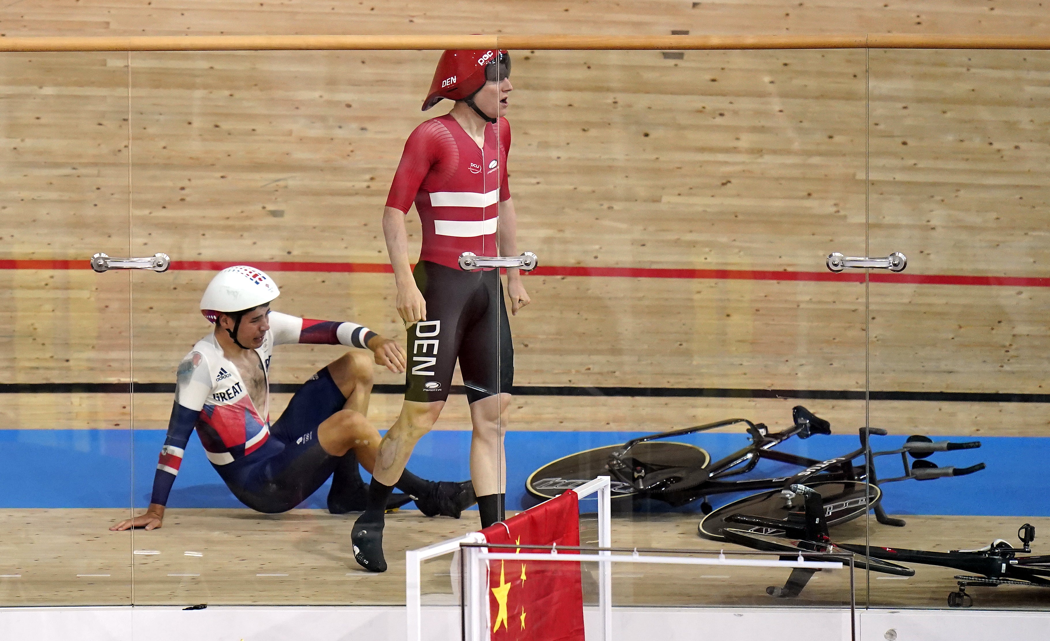 Great Britain’s Charlie Tanfield on the track after being crashed into by Denmark’s Frederik Madsen in the men’s team pursuit first round.