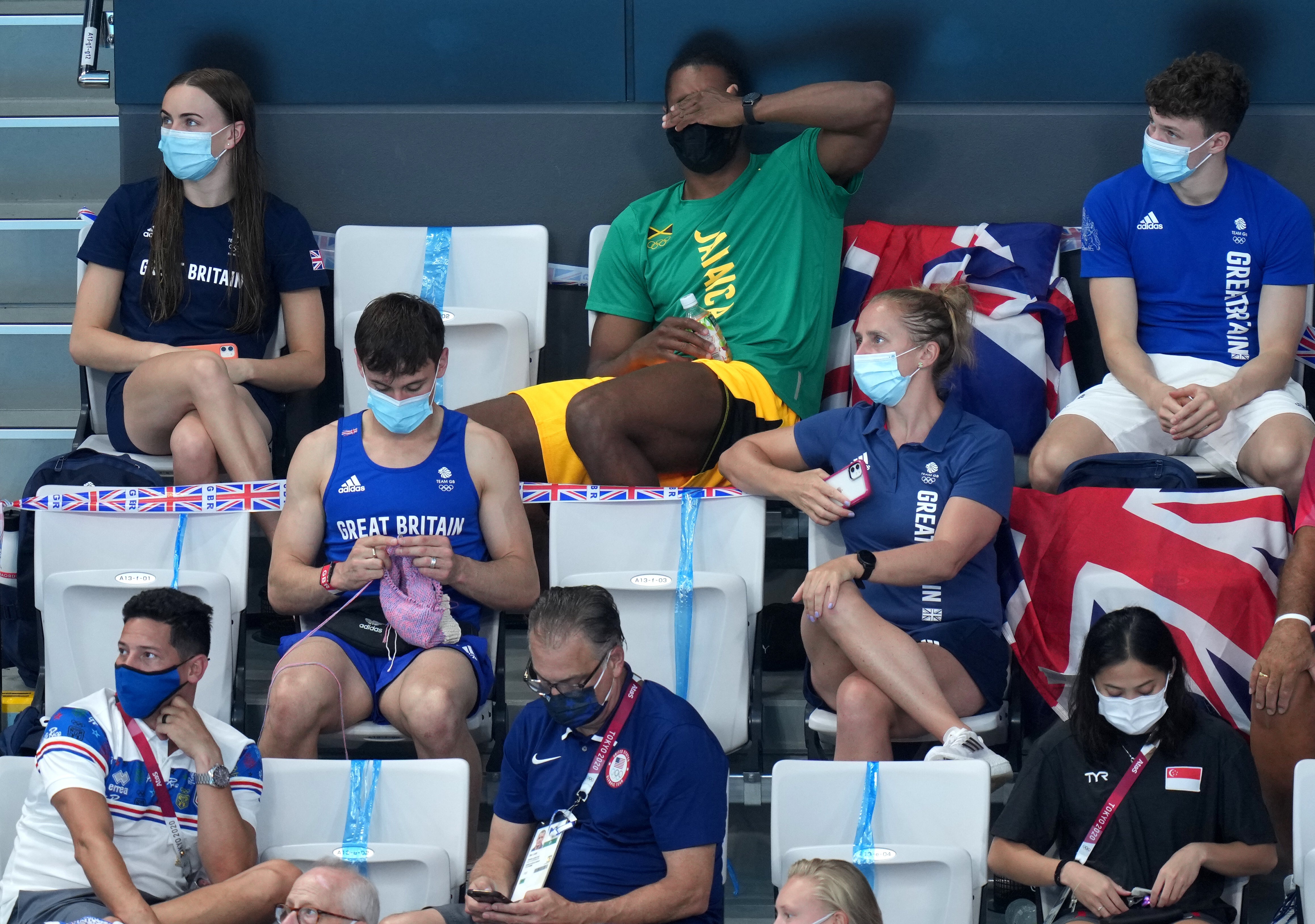 Tom Daley has been spotted knitting in the stands in Tokyo (Joe Giddens/PA)