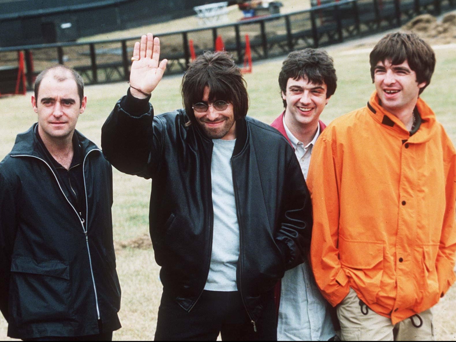 Paul ‘Bonehead’ Arthurs, Liam Gallagher, Paul ‘Guigsy’ McGuigan and Noel Gallagher before their performance at Knebworth, 1996