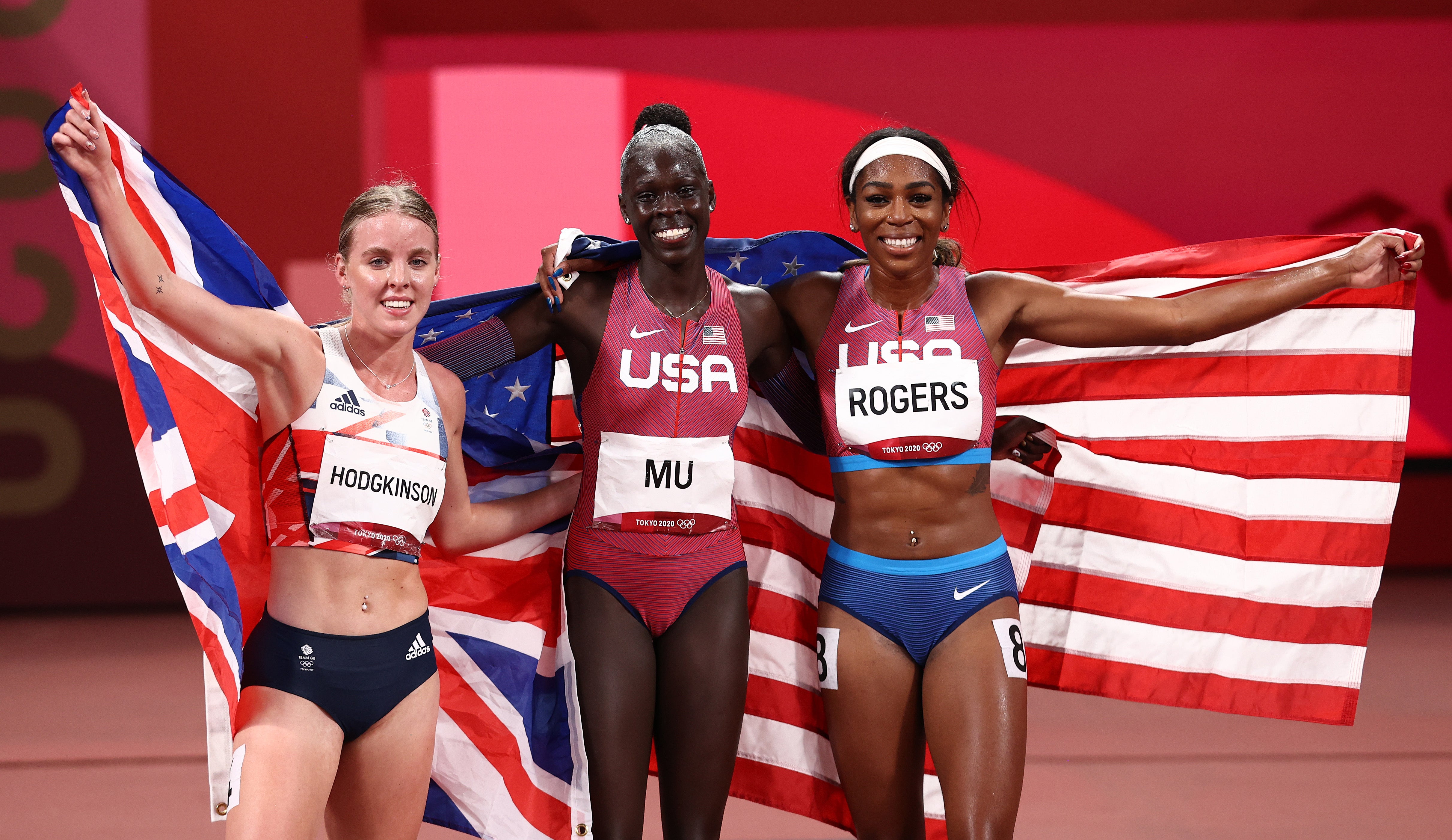 Silver medalist Keely Hodgkinson of Team Great Britain, gold medlaist Athing Mu of Team United States and bronze medalist Raevyn Rogers of Team United States