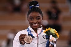 Simone Biles wins bronze on return to Tokyo Olympics as China’s Guan Chenchen takes balance beam gold