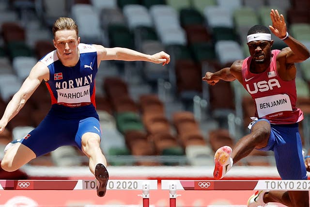 <p>Karsten Warholm of Norway and Rai Benjamin of the US in the men’s 400m hurdles final at the Tokyo 2020 Olympic Games</p>