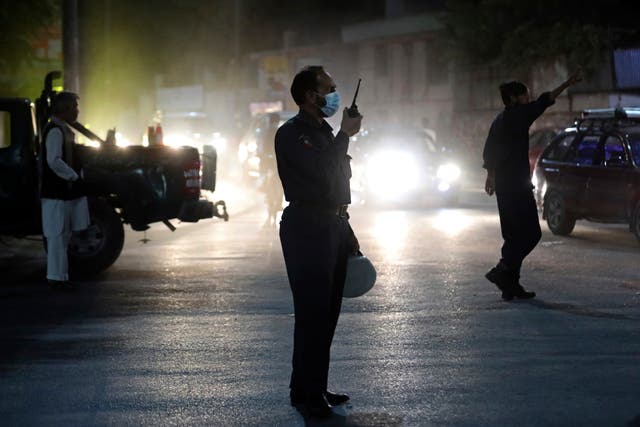 <p>Afghan security personnel work at the site of Tuesday’s powerful explosion in Kabul</p>