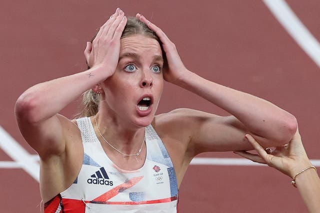 <p>Britain's Keely Hodgkinson celebrates after winning silver in the women's 800m final during the Tokyo 2020 Olympic Games at the Olympic Stadium in Tokyo on August 3, 2021</p>