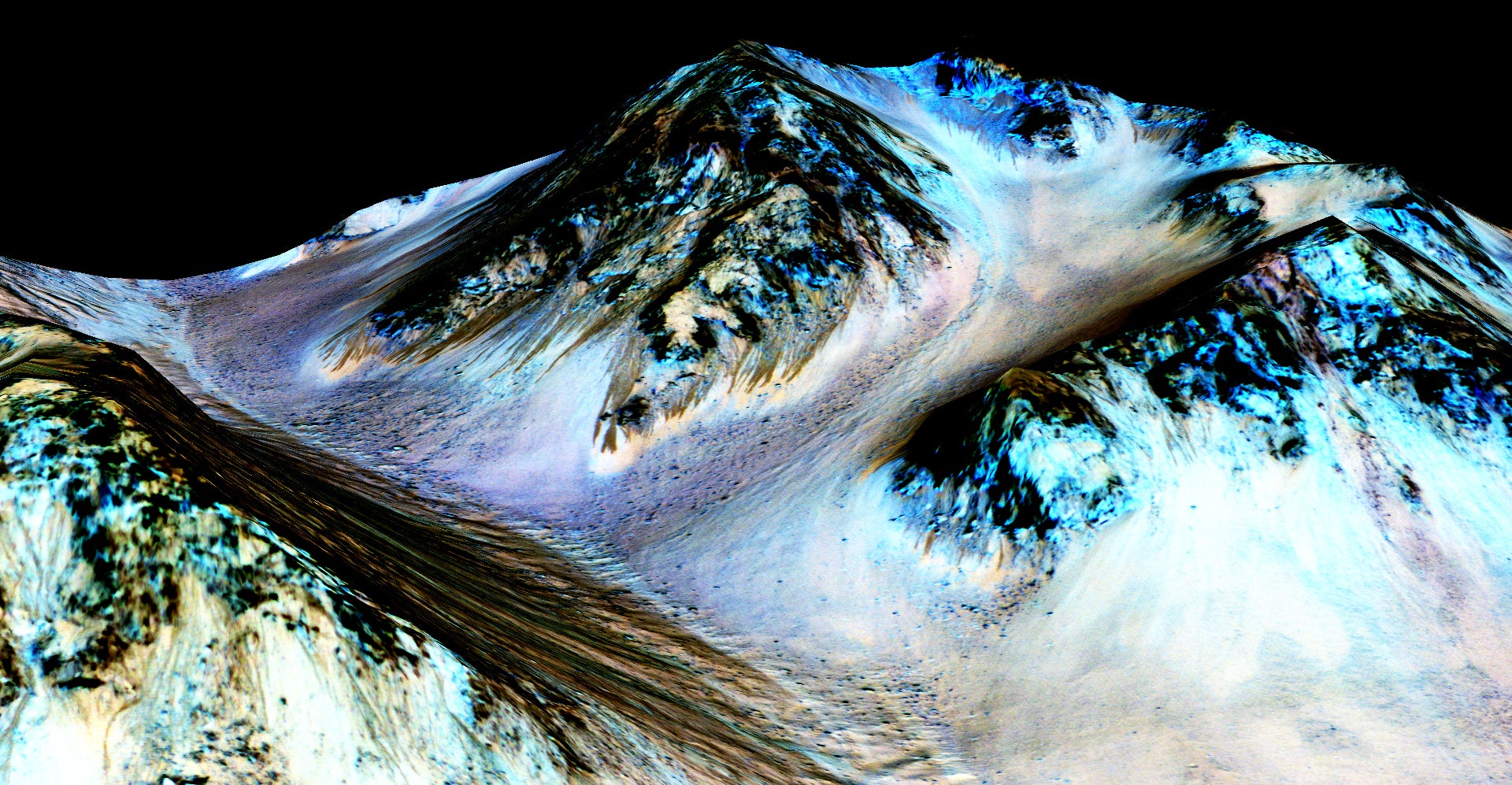 File: Nasa’s Mars Reconnaissance Orbiter handout shows dark, narrow streaks on the slopes of Hale Crater