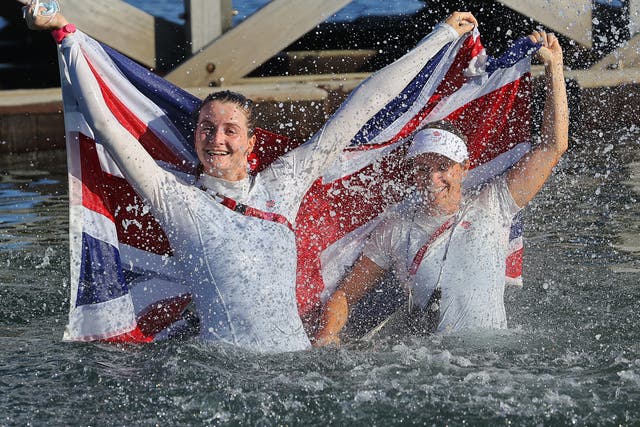 <p>Hannah Mills (right) and Eilidh McIntyre of Britain celebrate winning gold after the 470 class double-points race on Wednesday</p>