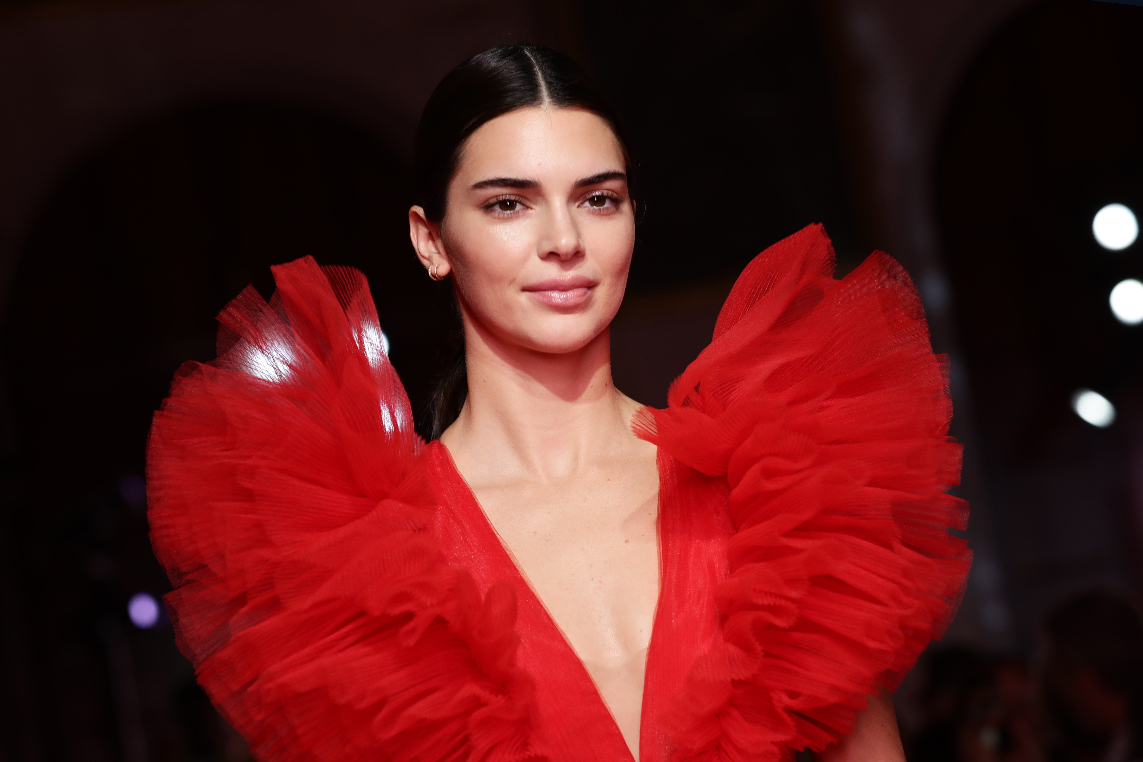 File image: Kendall Jenner walks the runway during the Giambattista Valli Loves H&M show 2019