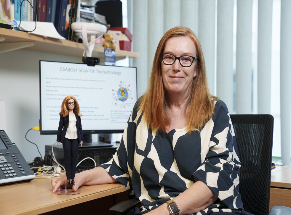 Professor Dame Sarah Gilbert holding a Barbie doll of herself (Mattel/PA)