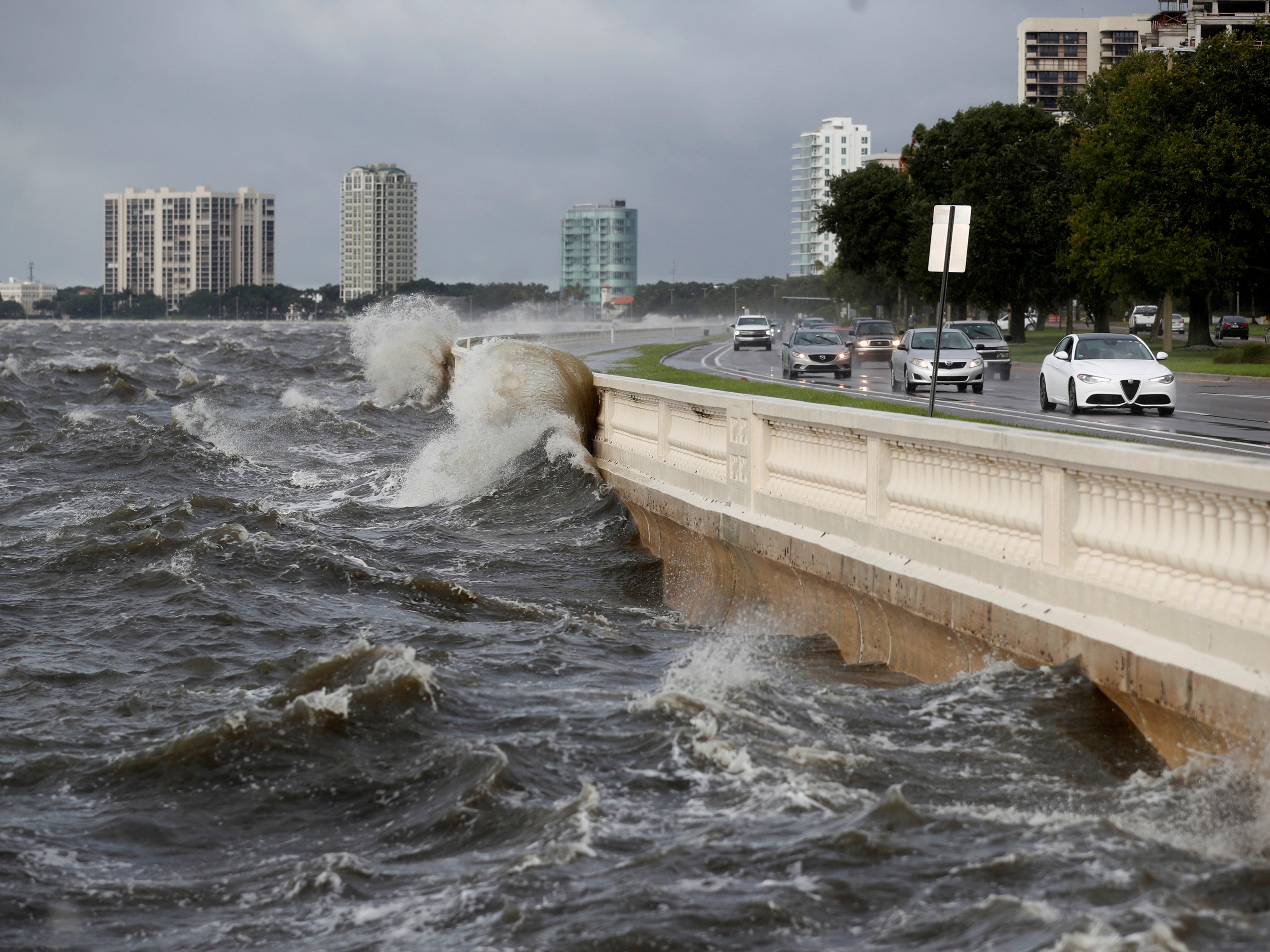 <p>Waves crash the balustrades on Bayshore Boulevard during high tide after Tropical Storm Elsa churns up the Gulf coast, in Tampa, Florida</p>