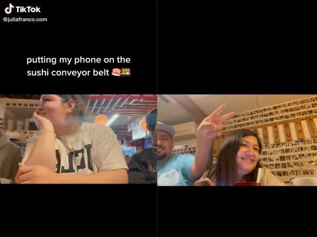 <p>Woman captures wholesome reactions from diners after placing phone on sushi conveyor belt </p>