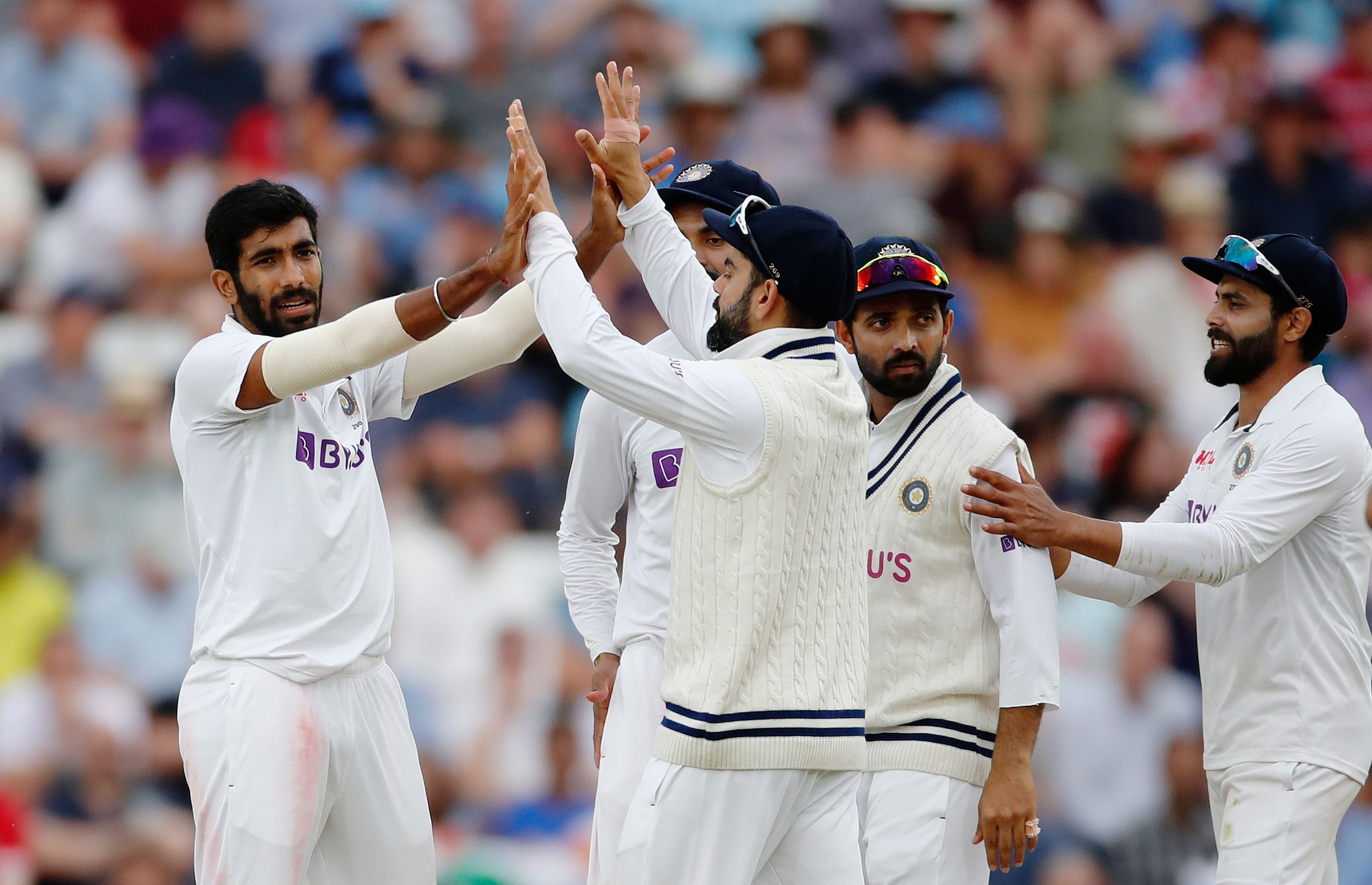 Jasprit Bumrah celebrates taking the wicket of Jos Buttler