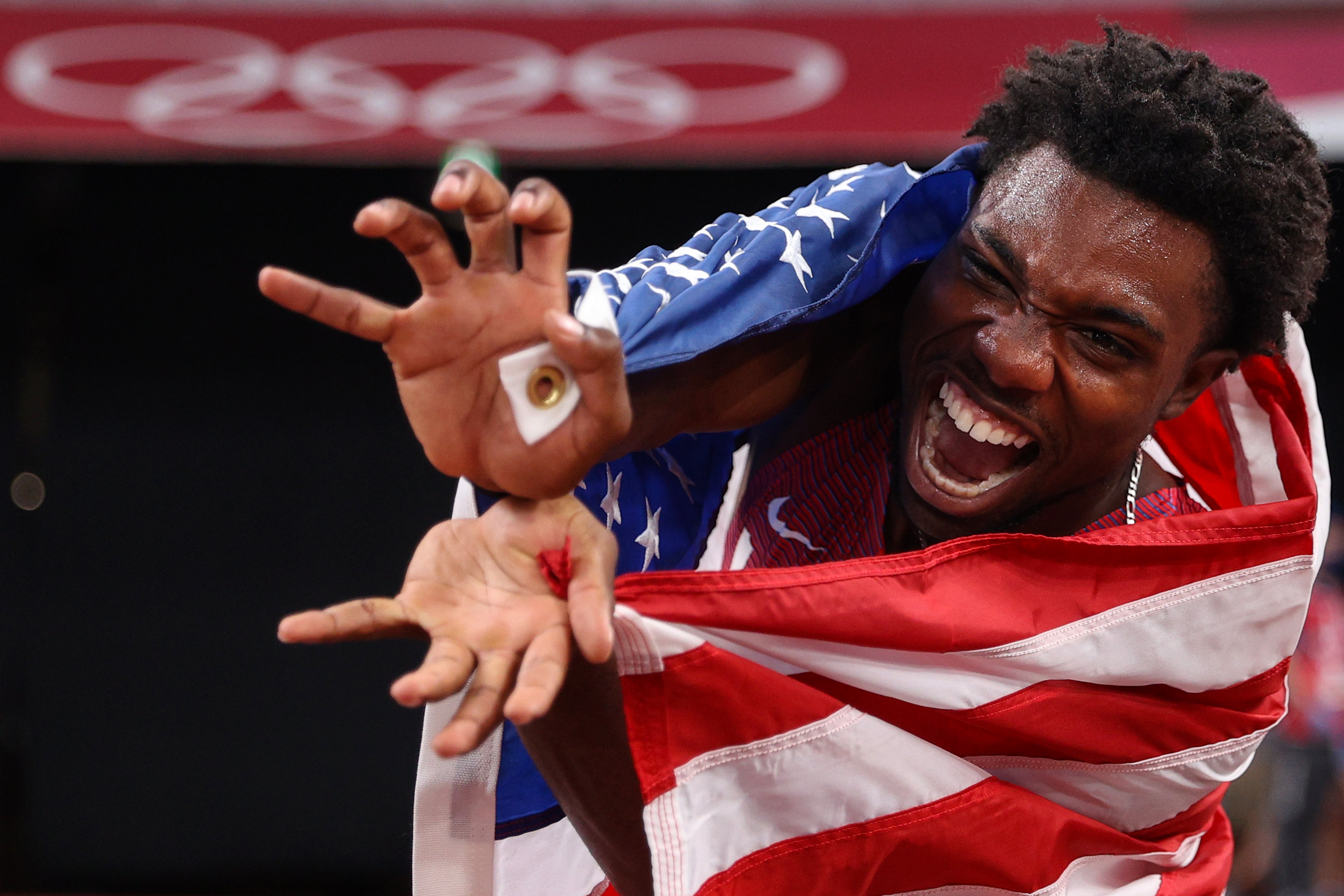 Noah Lyles of Team United States celebrates after winning the bronze medal in the Men's 200m Final on day twelve of the Tokyo 2020 Olympic Games at Olympic Stadium on August 4, 2021 in Tokyo, Japan.