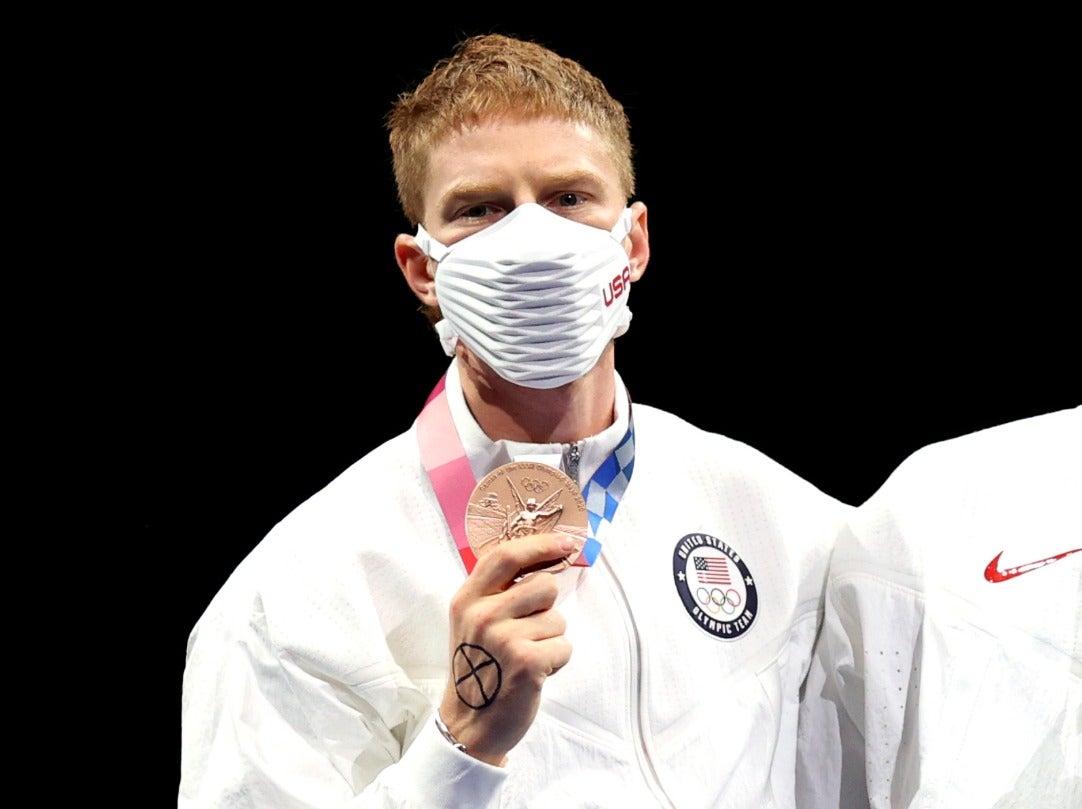 US fencer drew ‘X’ on hand to protest Olympic rule on demonstrations