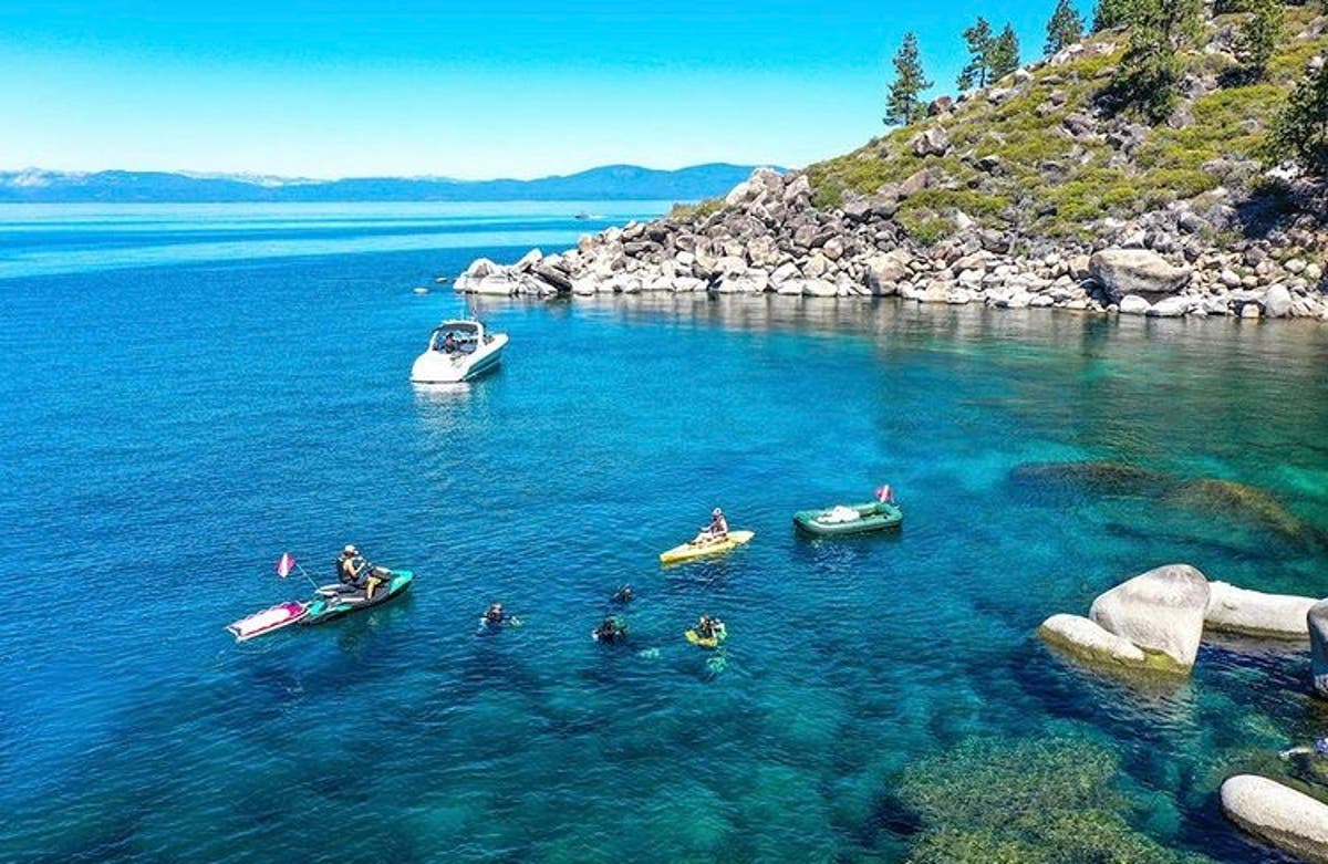 From rubber snakes to crawdad traps: Lake Tahoe dive cleanup pulls out more than 8,000 pounds of trash