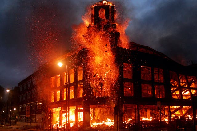 <p>Fire rages through a building in Tottenham during 2011 riots</p>