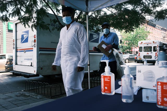 <p>File image:  A city-operated mobile pharmacy advertises the Covid-19 vaccine in a Brooklyn neighbourhood on 30 July 2021  in New York City</p>