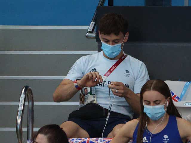 <p>Tom Daley knitting at the Olympics</p>